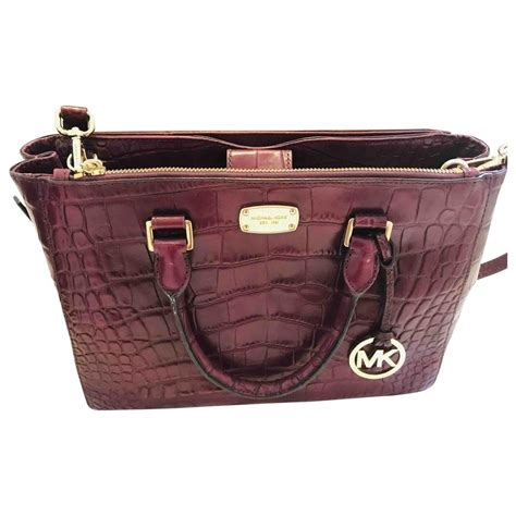 large burgundy michael kors leather handbag|burgundy Michael Kors bag.